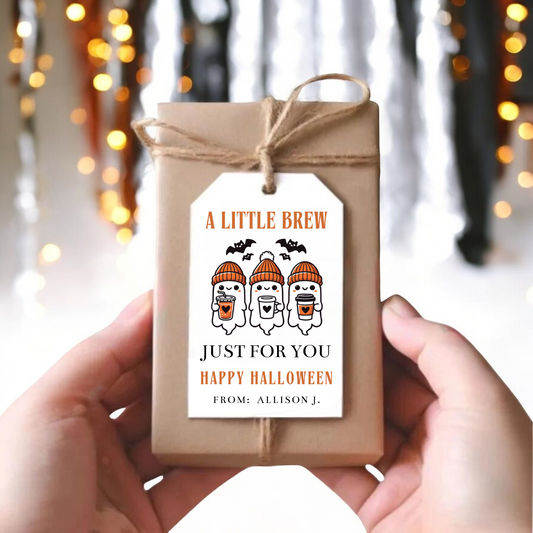 A small gift box with three ghosts holding coffee cups.