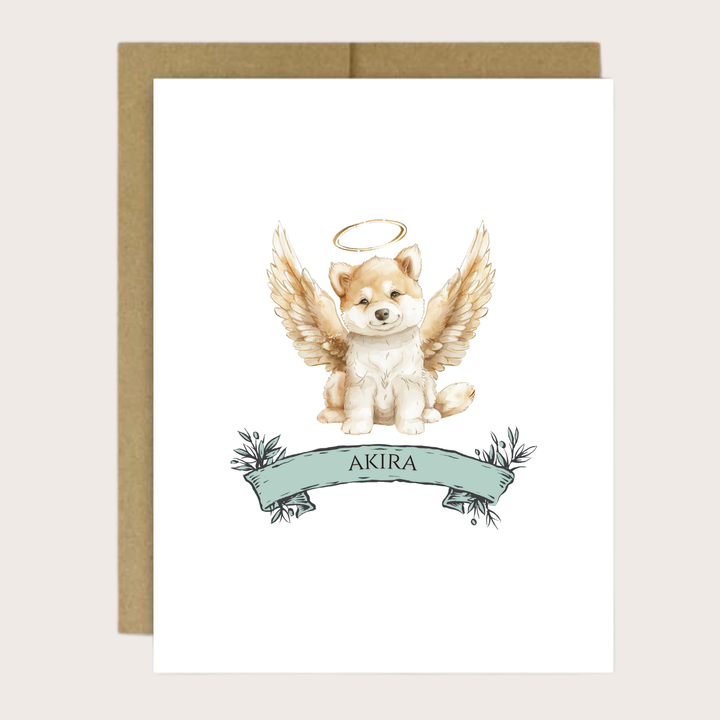 A greeting card of an Akita dog with halo and wings and the pet's name underneath.