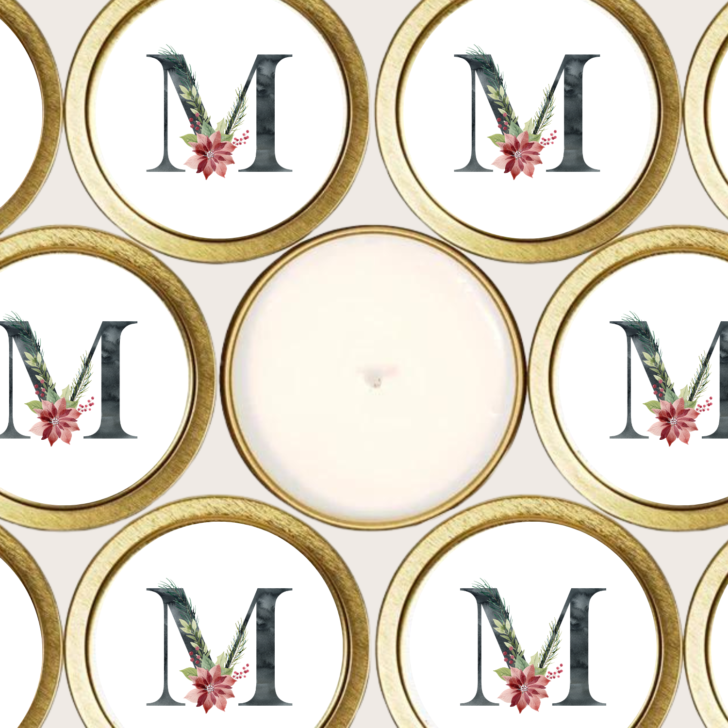 Gold candle tins with black initial and poinsettia flower.