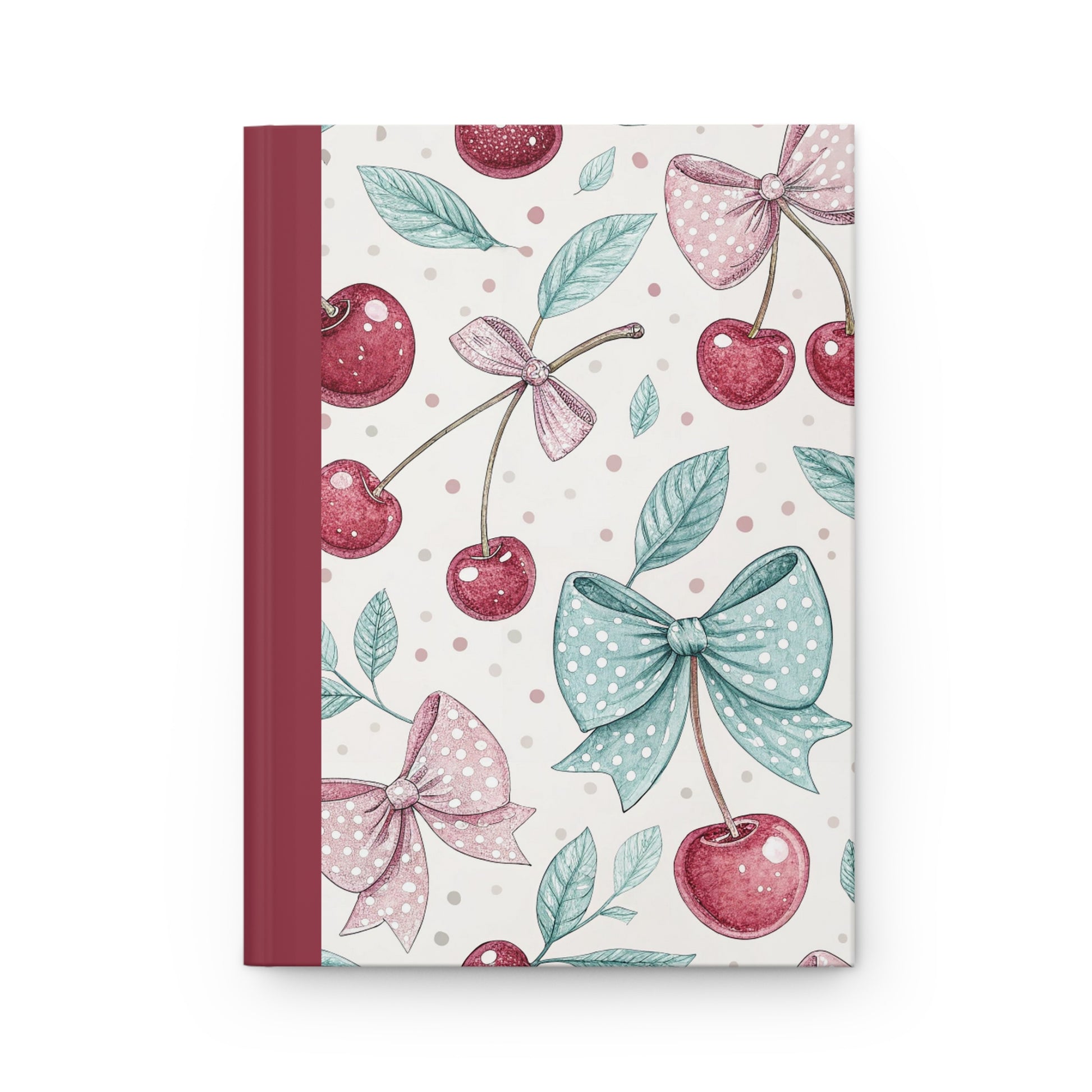 Journal with cherry and bow design on a white background