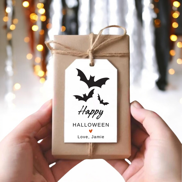 Small gift box with Halloween tag with bats and personalized name.