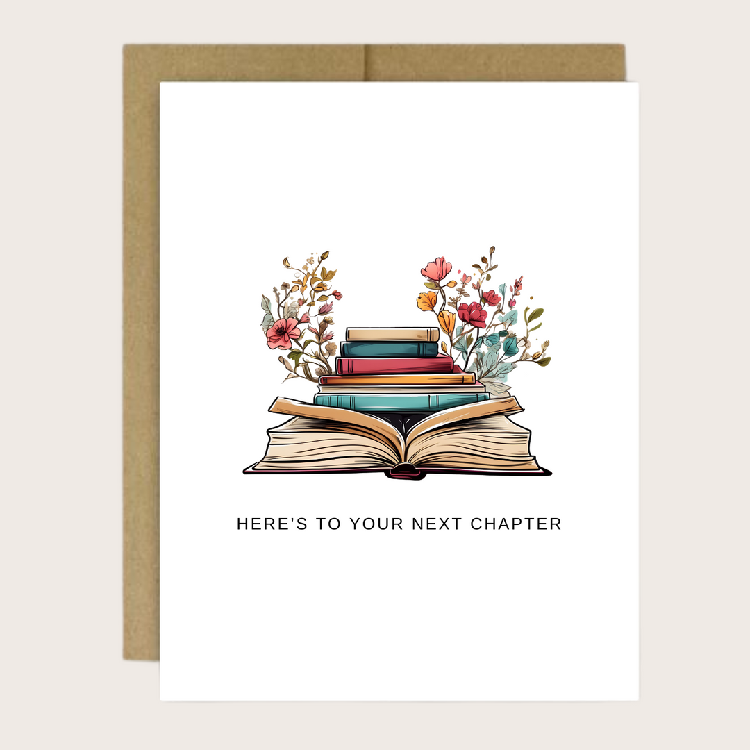 A greeting card with an open book and flowers.