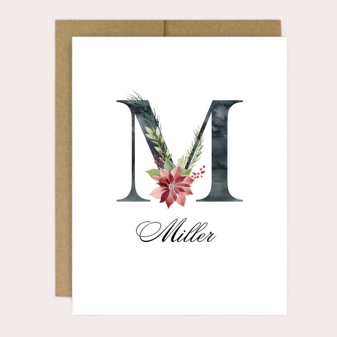 A holiday greeting card with an M initial and name.