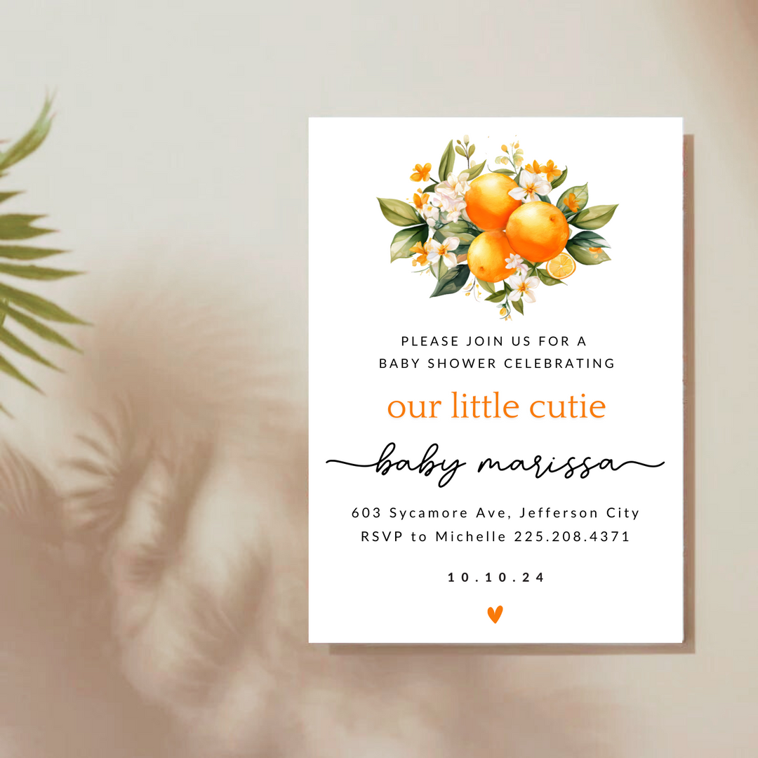 A baby shower invitation with little cutie orange design.