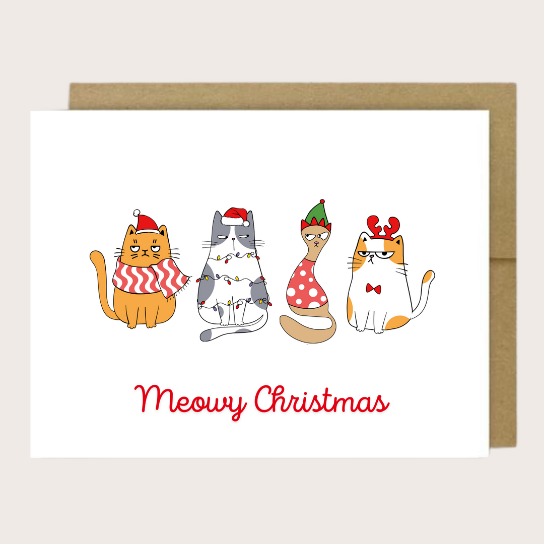 A greeting card with four cats and the sentiment Meowy Christmas.