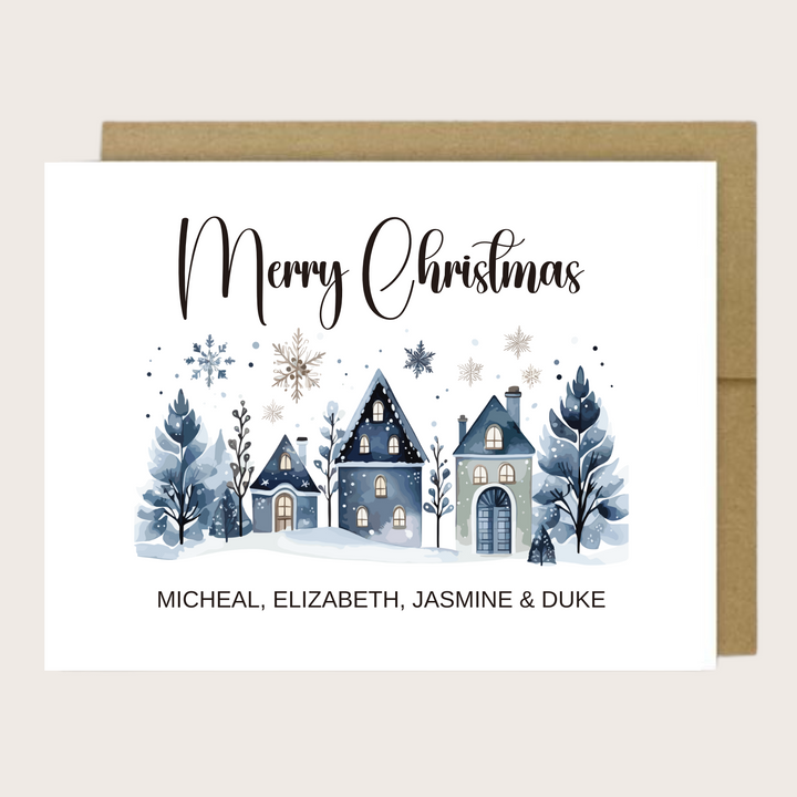 A greeting card with blue houses, snow, the sentiment Merry Christmas and family names.