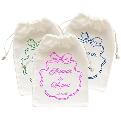 Three small wedding favor bags with colorful bow and personalized message.