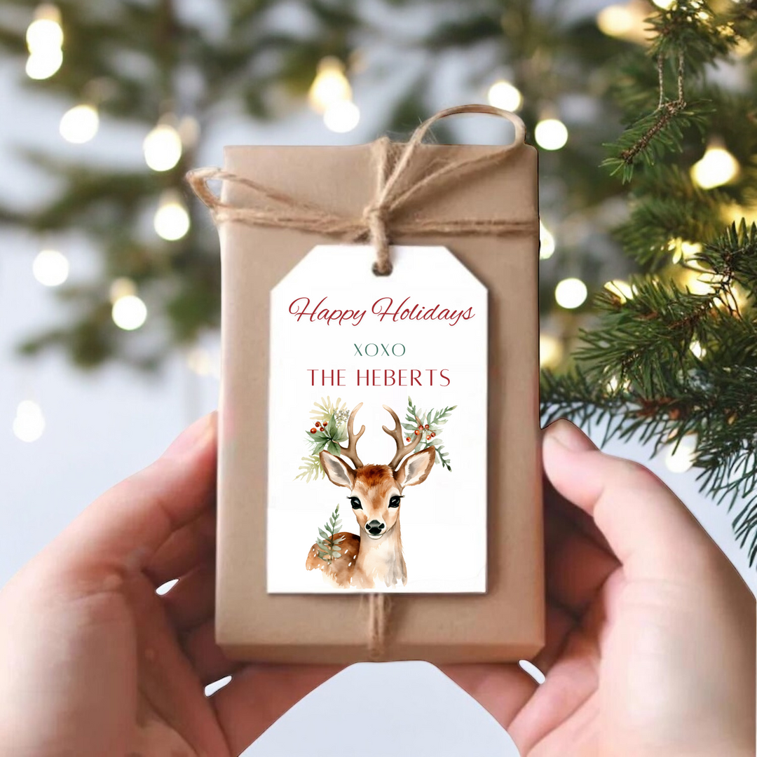 A small gift box with a watercolor reindeer and personalized name.